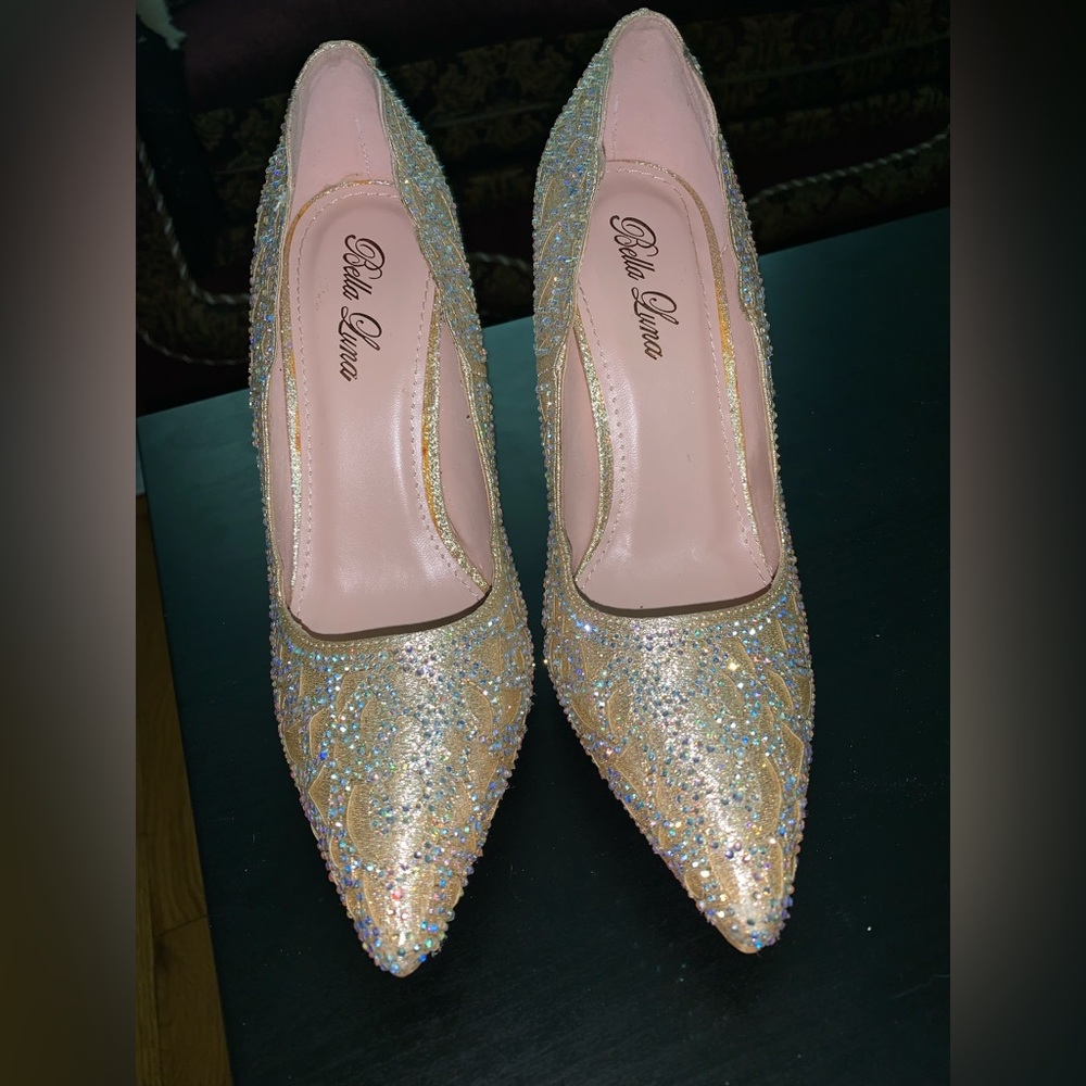 Selling these 4 inch heels in the color gold with iridescent gems
